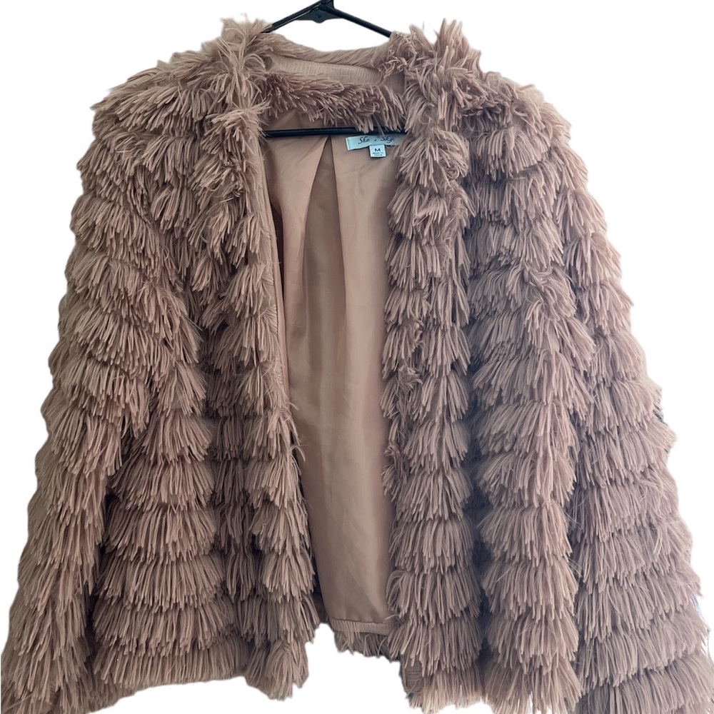 Thin, lightweight boutique coat